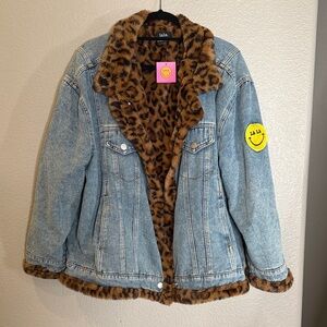 Dressed in LALA oversized denim jacket with leopard fur lining. NWT